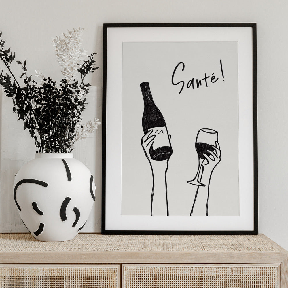 Hands holding a wine bottle and a wine glass with the text "Cheers!" in French - Art Print by Rio Soléy