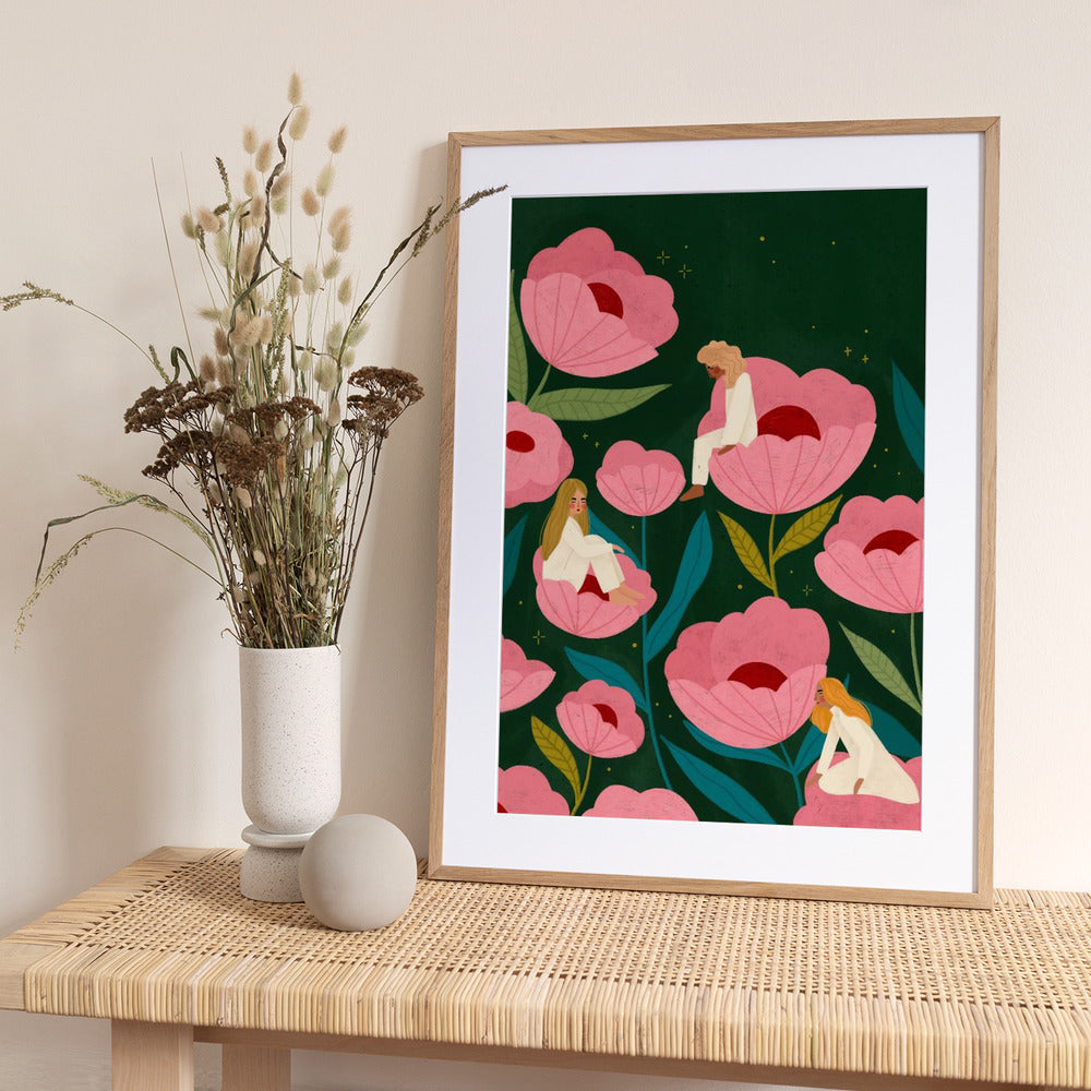 Three Women Sitting on Large Pink Flowers - Art Print by Bea Müller