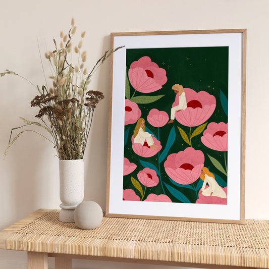 Three Women Sitting on Large Pink Flowers - Art Print by Bea Müller