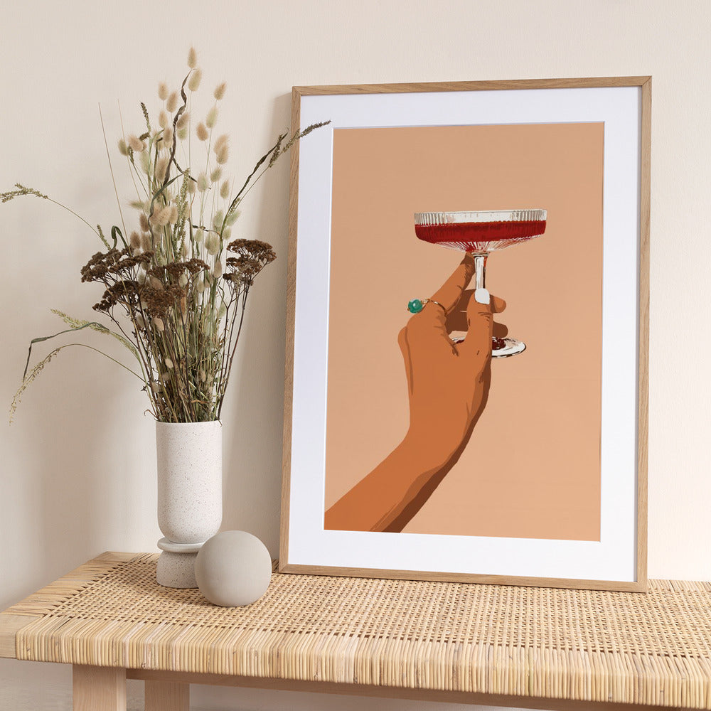 A Hand Holding A Glass Of Red Wine - Art Print by Uma Gokhale